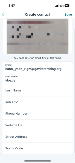 HubSpot iOS app 'Create contact' screen after business card scan, email and first name pre-filled, other fields blank