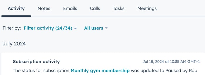 HubSpot activity timeline showing a subscription was paused along with the internal note.