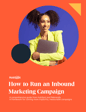 A smiling woman with curly hair styled in pigtails is holding a laptop, wearing a bright lime green blazer against a vivid blue background, accompanied by a promotional graphic for an inbound marketing campaign.